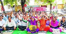 Activists of the Communist Party of India (Marxist) protest in Jammu on Friday.