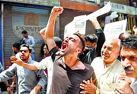 Activists of the Jammu and Kashmir Liberation Front raise anti-Israel slogans in Srinagar on Friday during a protest against Israeli military operations in Gaza.