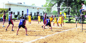 Teams comprising former drug addicts and those undergoing treatment compete in a volleyball match during the Recovery Cup tournament in Ludhiana on Friday.