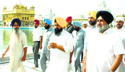 Deputy CM Sukhbir Badal pays obeisance at the Golden Temple in Amritsar on Friday. Tribune photo 