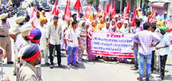 The police stop Dalit protesters of Balad Kalan village from heading towards the judicial courts complex in Sangrur on Friday. A Tribune photograph