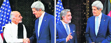 US Secretary of State John Kerry with Afghan presidential candidates Ashraf Ghani Ahmadzai L) and Abdullah Abdullah at US Embassy in Kabul on Friday. AP/PTI 