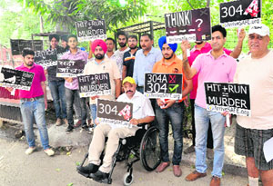 Members of the NGO, Arrive Safe, protest in Industrial Area, Phase I, Chandigarh, on Saturday.