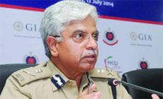 Delhi Police Commissioner B S Bassi addresses a seminar on ''Face to Face with Delhi Police on Women Safety'' organised by FICCI Ladies Organisation (FLO) in New Delhi on Saturday.