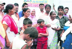 Residents of the Gandhi Camp area protest against the district administration on Saturday