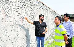 The newly inaugurated wall mural at Wagah. A Tribune photograph