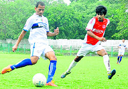 Players in action during the Nemidas Memorial District Football League at the Pavilion Ground in Dehradun on Sunday