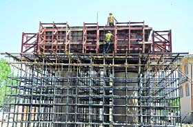 Work in progress on the multi-crore Jehangir Chowk-Rambagh flyover in Srinagar on Sunday