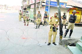 Security personnel keep vigil in downtown Srinagar on Sunday