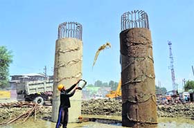 Work in progress on the multi-crore Jehangir Chowk-Rambagh flyover in Srinagar on Sunday