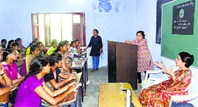 Students attend a lecture on family planning at SDP Collegiate Girls Senior Secondary School in Ludhiana.