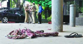 The burnt cloth of a woman who tried to immolate herself in front of the Delhi Police headquarters in New Delhi on Monday.