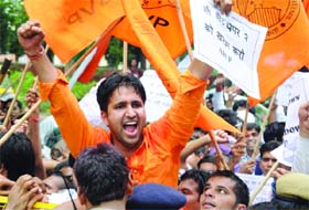 ABVP activists shout slogans during a demonstration outside the UPSC office, demanding the scrapping of Civil Services Aptitude Tests (C-SAT) in New Delhi on Monday.