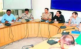 A Kanwar mela review meeting underway in Haridwar on Monday.