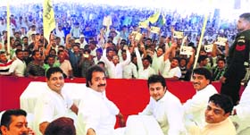 Haryana Janhit Congress chief Kuldeep Bishoni and other leaders during the Parivartan rally at the Thanesar grain market in Kurukshetra on Monday