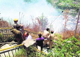 Forest and fire staff struggle to control fire in Chamba forest on Friday