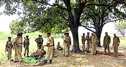 Security personnel guard the disputed land in Bishnah tehsil on Monday