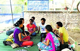 Students of the College of Fisheries protest at Guru Angad Dev Veterinary and Animal Sciences University in Ludhiana on Monday.