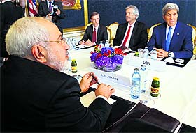  Irans Foreign Minister Javad Zarif (L) holds a bilateral meeting with US Secretary of State John Kerry (R) on the second straight day of talks over Tehrans nuclear programme in Vienna on Monday.