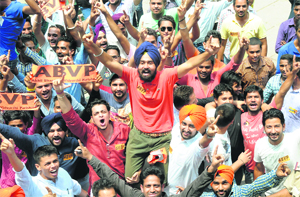 ABVP members in a jubilant mood after the party declared Sukhjot Singh Sidhu (held aloft by students), for the post of president for the student elections at Panjab University in Chandigarh on Tuesday.