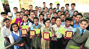 Representatives from tricity schools pose with their trophies during a workshop on sustainable environment at The Millennium School, Mohali, on Tuesday.