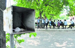The CCTV box installed at the entry of a paid parking lot to record the registration number of vehicles and capture the image of the driver is lying empty in Sector 8, Chandigarh