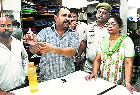A man shows the hidden camera in Ludhiana. 