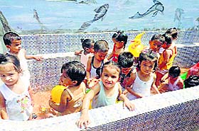 Children enjoy a pool party at Babies Paradise in Ludhiana.