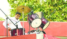 Indian drummer in action at Wagah border in Amritsar.