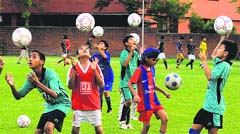 Players practise at the Chandigarh Football Academy, Sector 42, Chandigarh, on Wednesday. Tribune photo: Vicky Gharu