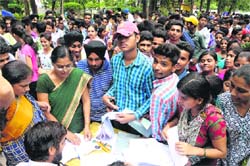 Students submit their admission forms for Class XI at Government Model Senior Secondary School, Sector 37, Chandigarh, on Wednesday. Tribune Photo: S Chandan