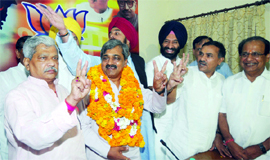 President of the Delhi BJP unit Satish Upadhyay with the MLAs during a meeting at the party office in New Delhi on Wednesday