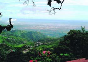 Lost horizon: A view of the Doon valley as the sky clears up briefly following overnight rain in Mussoorie