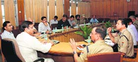Uttarakhand Home Minister Pritam Singh meets police and home officials in Dehradun on Wednesday