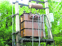 An overloaded power transformer in the Urban Estate area of Jind.