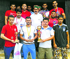 Winners of the Senior State Power Lifting Championship trophy with KS Pathania, president, HP Power Lifting Association, at Rait on Tuesday.