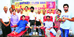 College students donate blood at a camp organised in SVSD College, Bhatoli, in Una on Wednesday.