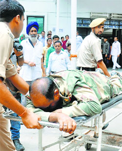 An injured BSF man at a Jammu hospital.