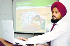 A speaker makes a presentation during an induction programme at the GGN Institute of Management and Technology in Ludhiana