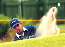 Anirban Lahiri hits out of a bunker during a practice round at the Royal Liverpool Golf Club in Hoylake on Wednesday