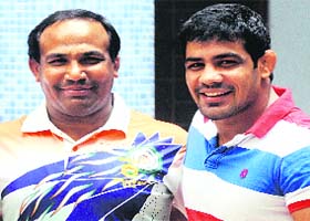 Sushil with coach Vinod Kumar