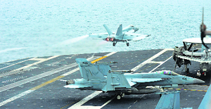 A US F18 Hornet fighter jet takes off from US aircraft carrier USS George Washington during a military exercise off the west coast of South Korea on Wednesday.