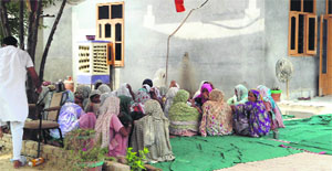 Women wail at Simarjit Singhs residence at Rajgarh Kubbe village in Bathinda district on Thursday.