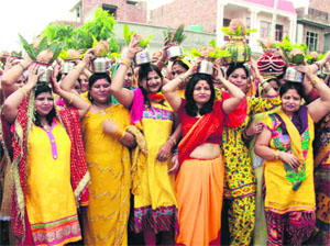 Women take part in a kalash yatra at Patel Nagar in Bathinda on Thursday.