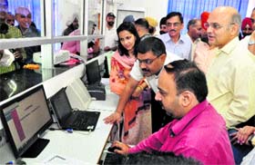 UT Adviser KK Sharma (right) at the launch of new services at the e-Sampark Centre in Sector 21, Chandigarh, on Thursday
