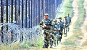 BSF personnel keep vigil along the international border in Jammu