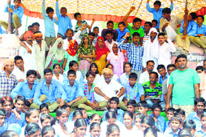 Parents and students outside Govt Middle School, Manewala, on Thursday.