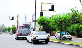 a non-functional traffic signal on the airport road in Amritsar.