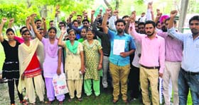 Students protest against the withdrawal of fee concession in Bathinda on Friday.