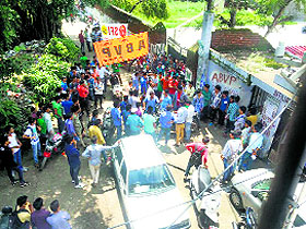 Activists of the SFI and the NSUI argue at the MCM DAV College gate in Kangra on Friday.